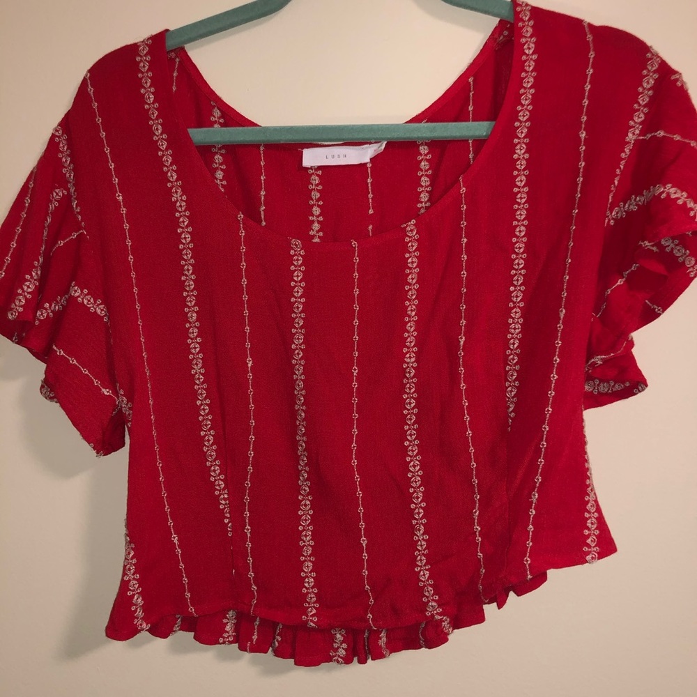 Adorable red blouse with white stitched embroidery
